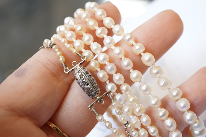A natural pearl and diamond necklace, early 20th century